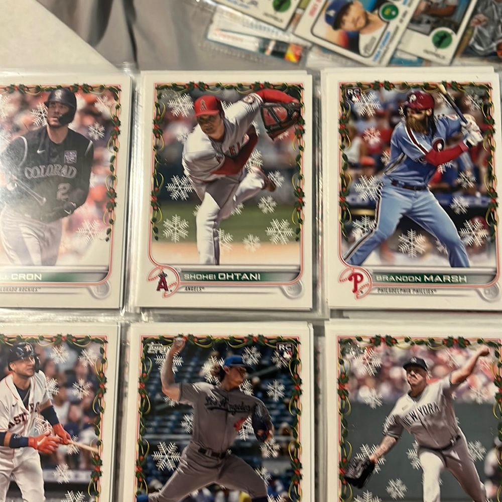 Binder with approx 40 card pages filled front in back at 18 cards per page